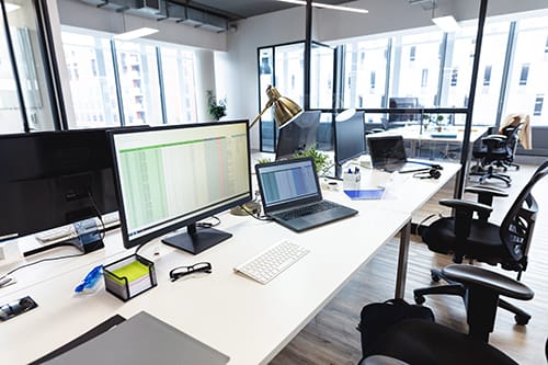 A modern workstation focused on data analysis, reflecting the company's emphasis on precise data processing.